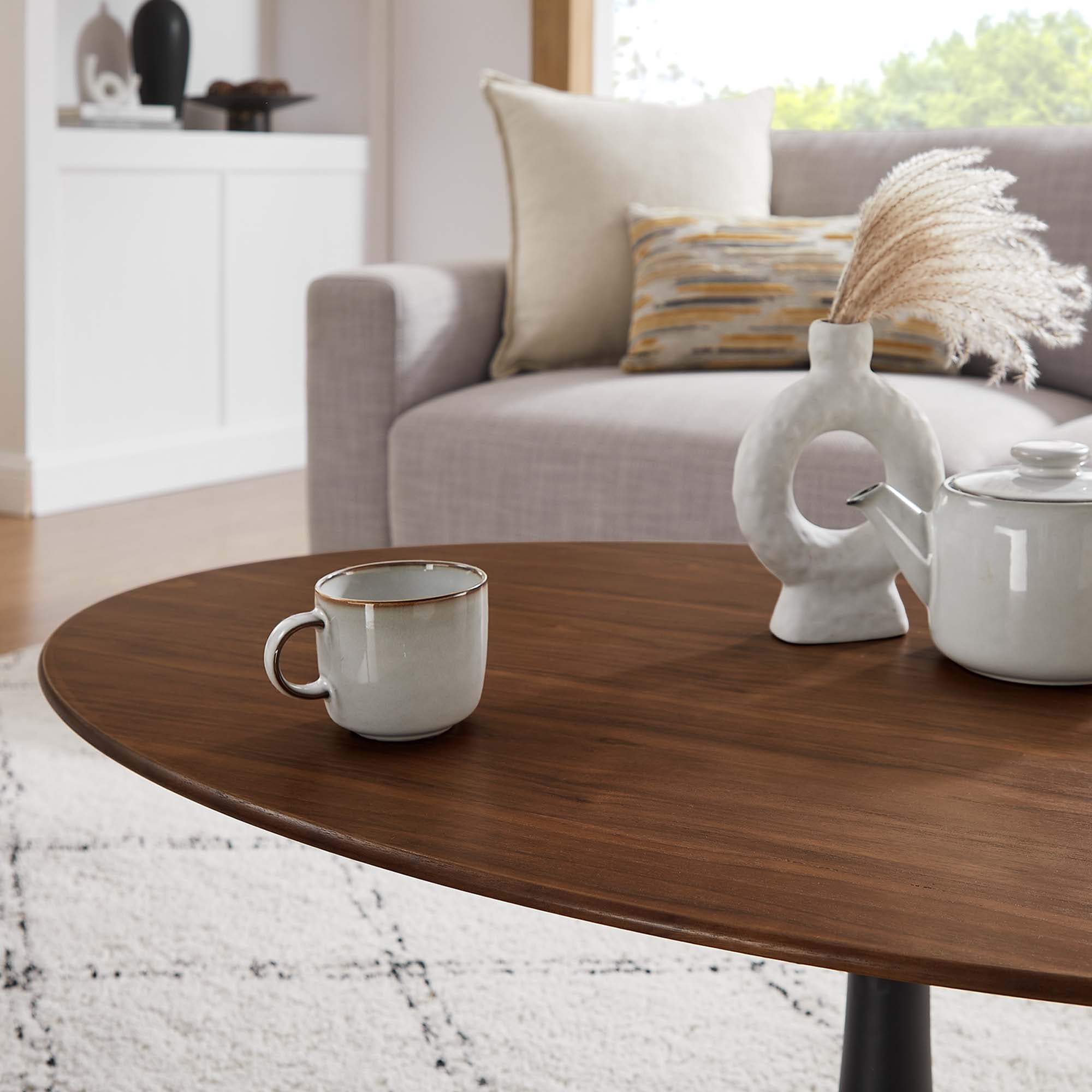 Lippa 48" Oval Wood Coffee Table - Black Walnut